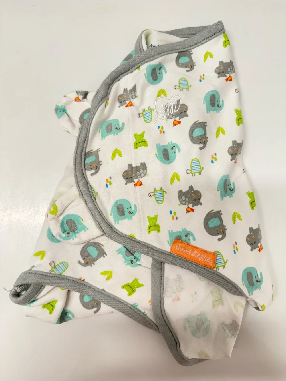 SwaddleMe Baby Swaddle - White with Teal, Gray & Lime Animal Print